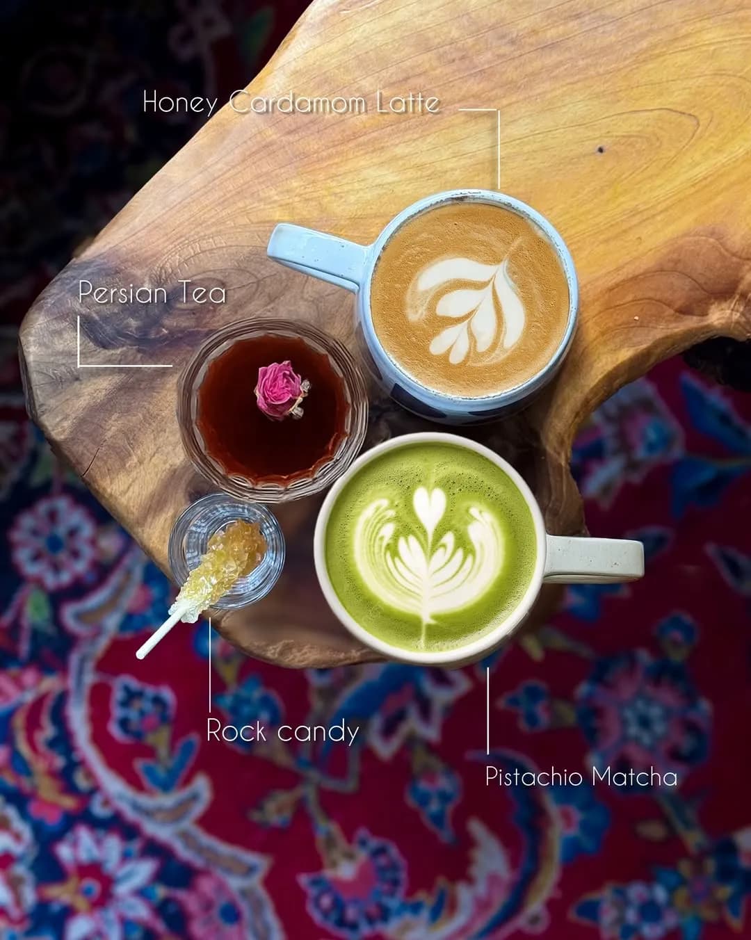Honey cardamom latte, Persian tea, rock candy and pistachio matcha on a wooden table